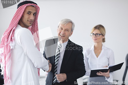 Image of Arabic business man at meeting