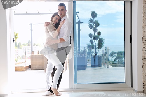 Image of happy young couple relax at home