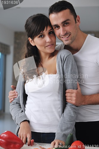 Image of young couple have fun in modern kitchen