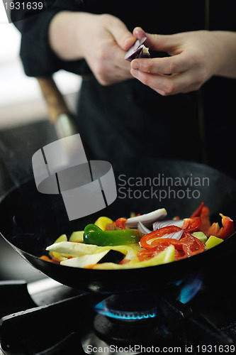 Image of chef preparing meal