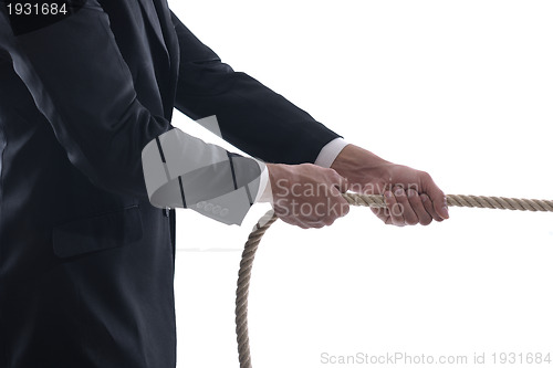 Image of business man with rope isolated on white background