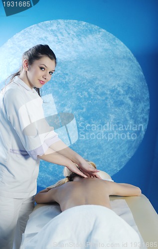 Image of Beautiful young woman in spa