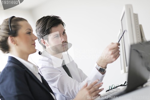 Image of business people group working in customer and help desk office