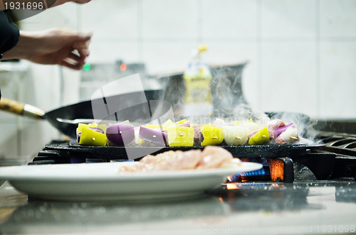 Image of chef preparing meal
