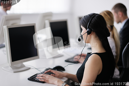 Image of business people group working in customer and help desk office