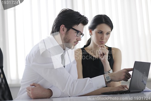 Image of business people in a meeting at office