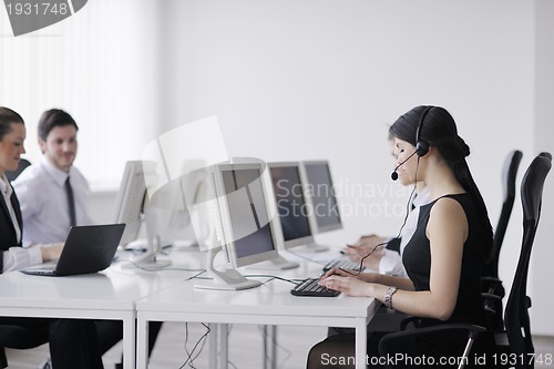 Image of business people group working in customer and help desk office