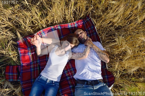 Image of happy couple in wheat field