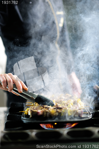 Image of chef preparing meal