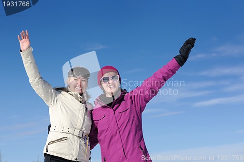 Image of winter season fun with group of girls