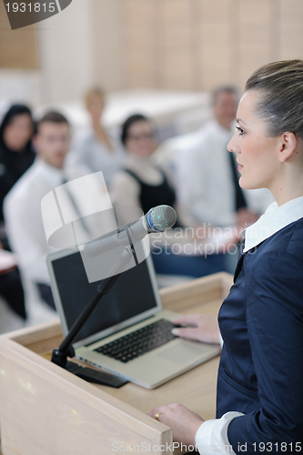 Image of business woman giving presentation