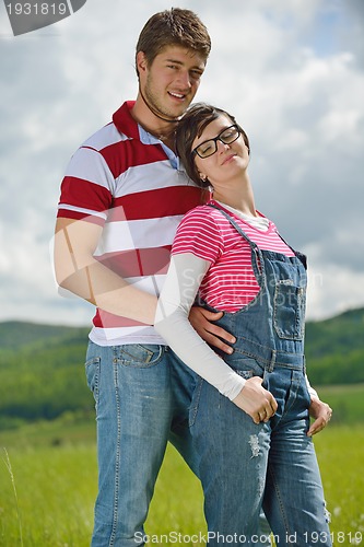 Image of romantic young couple in love together outdoor