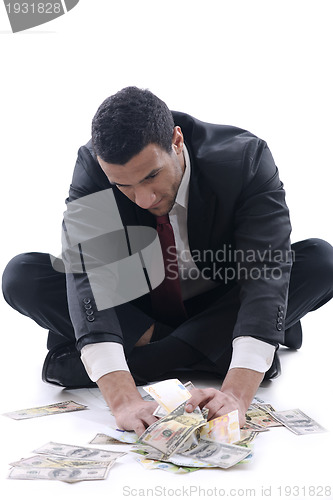 Image of Business man holding money