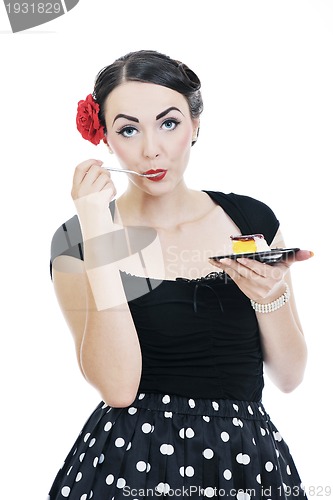 Image of beautiful young woman eat sweet cake