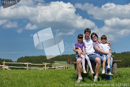 Image of happy young family have fun outdoors