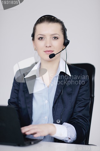 Image of business woman group with headphones