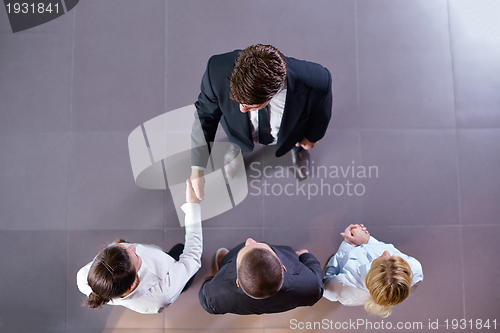 Image of business people making deal