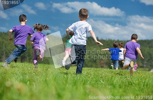 Image of happy kids group  have fun in nature