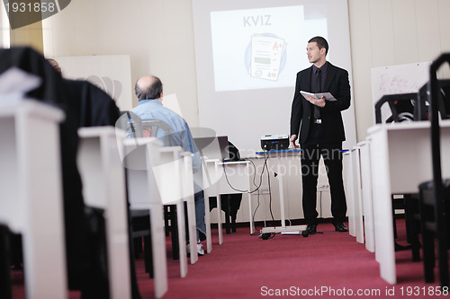 Image of business man on seminar