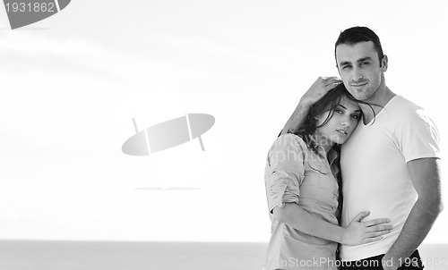 Image of couple relaxing on balcony
