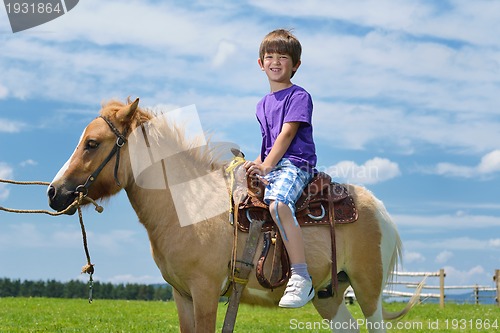 Image of child ride pony