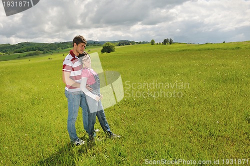 Image of romantic young couple in love together outdoor