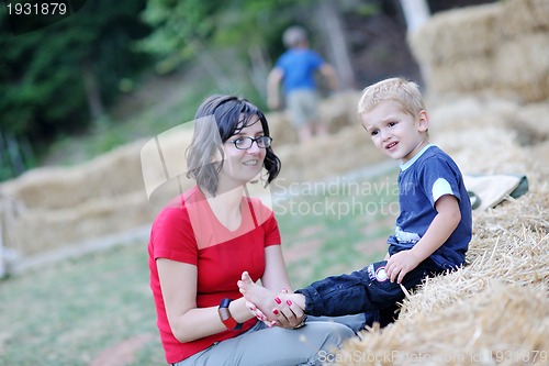 Image of woman and child have fun outdoor