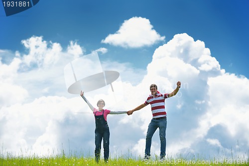 Image of romantic young couple in love together outdoor
