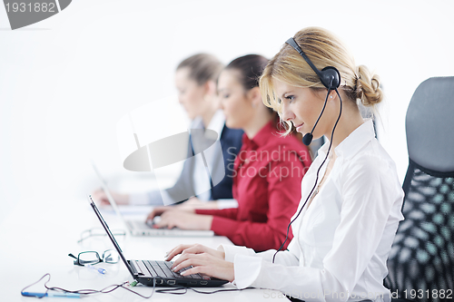 Image of business woman group with headphones