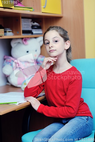 Image of girl doing homework