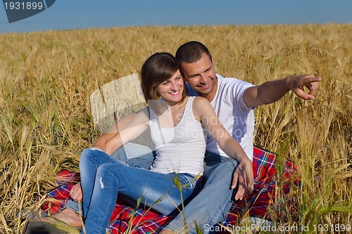 Image of happy couple in wheat field