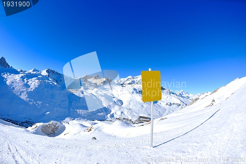 Image of Sign board at High mountains under snow in the winter