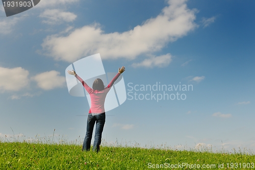 Image of happy young woman outdoor in nature
