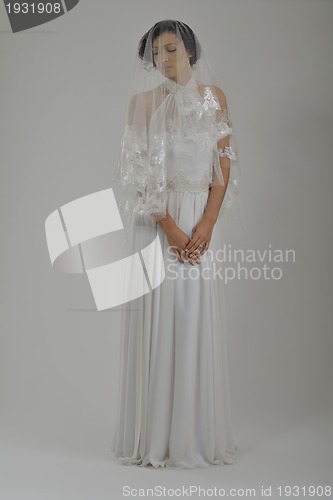 Image of Portrait of a beautiful woman dressed as a bride