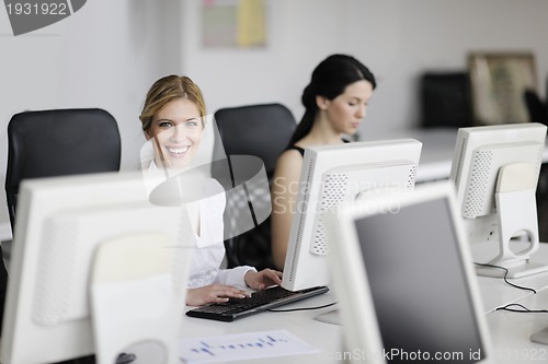 Image of business people group working in customer and help desk office