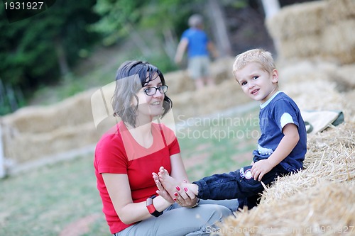 Image of woman and child have fun outdoor