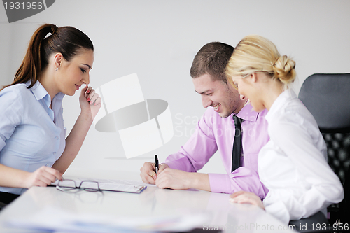 Image of Group of young business people at meeting