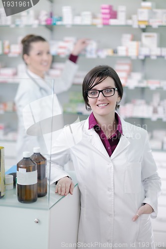 Image of team of pharmacist chemist woman  in pharmacy drugstore