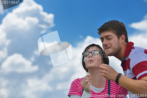 Image of romantic young couple in love together outdoor