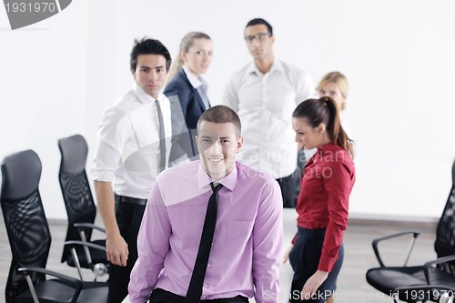 Image of young business man at meeting