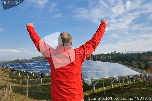 Image of Male solar panel engineer at work place