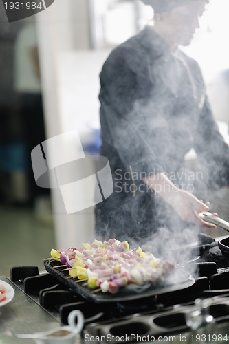 Image of chef preparing meal
