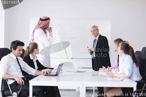 Image of Arabic business man at meeting