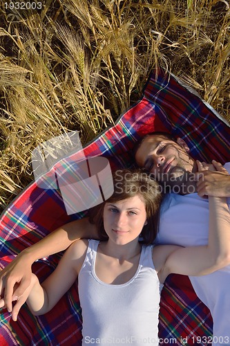 Image of happy couple in wheat field