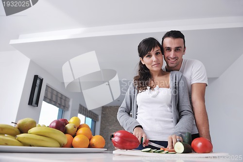 Image of young couple have fun in modern kitchen