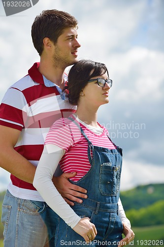 Image of romantic young couple in love together outdoor