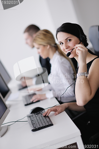 Image of business people group working in customer and helpdesk office