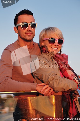 Image of couple in love  have romantic time on boat