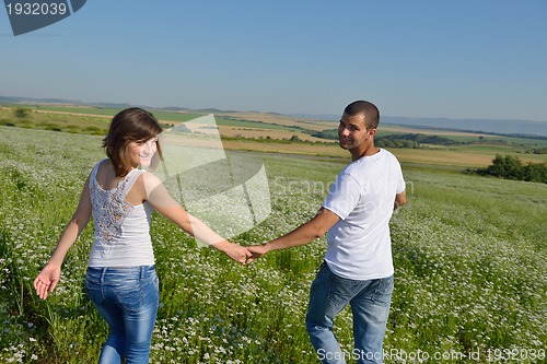Image of happy couple in wheat field
