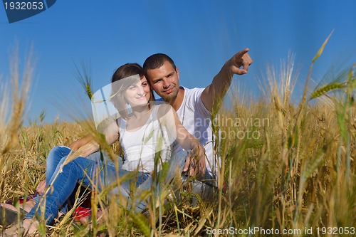 Image of happy couple in wheat field